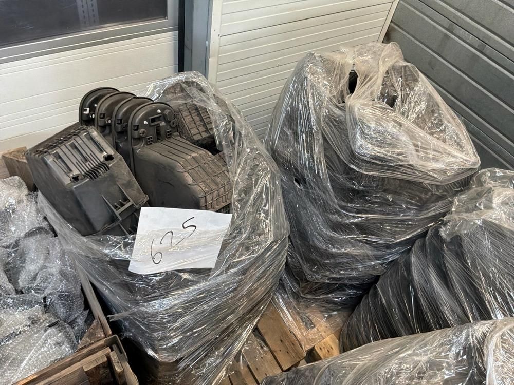 Super Soco Cux handlebars, spoilers, hand brakes, pallet of unused helmets, controllers (12x)