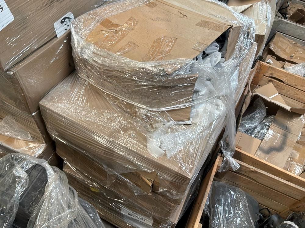 Super Soco Cux handlebars, spoilers, hand brakes, pallet of unused helmets, controllers (12x)