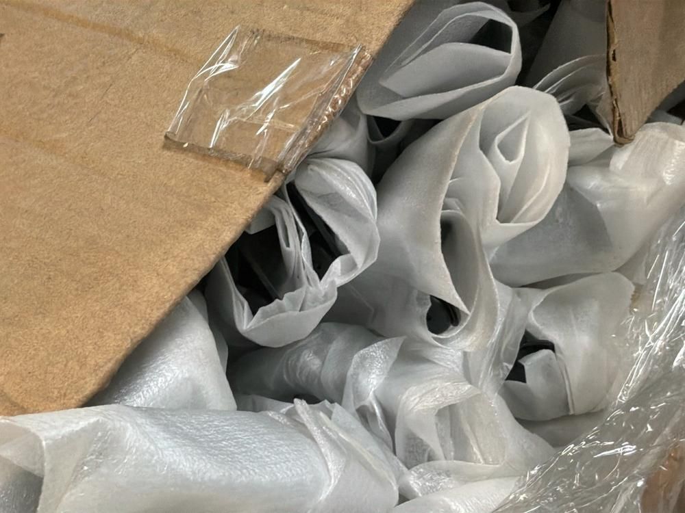 Super Soco Cux handlebars, spoilers, hand brakes, pallet of unused helmets, controllers (12x)