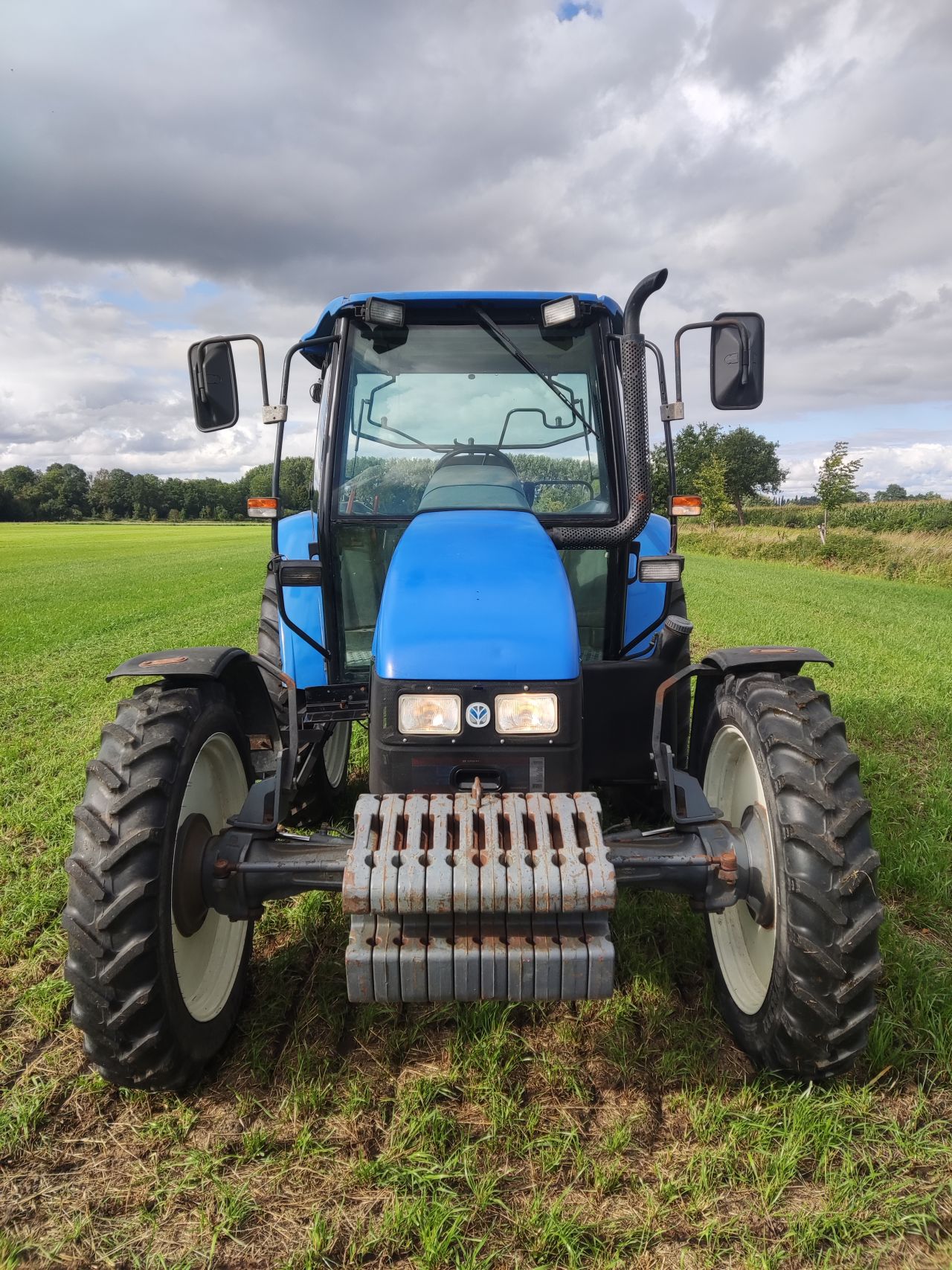 NEW HOLLAND tractor (type TL90, 90 pk, 5.768 uur, 4WD,)