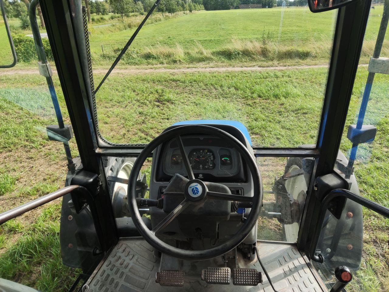 NEW HOLLAND tractor (type TL90, 90 pk, 5.768 uur, 4WD,)