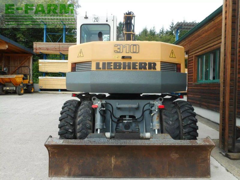 Liebherr a310b ( 12.000kg ) hydr. sw + 2 löffel
