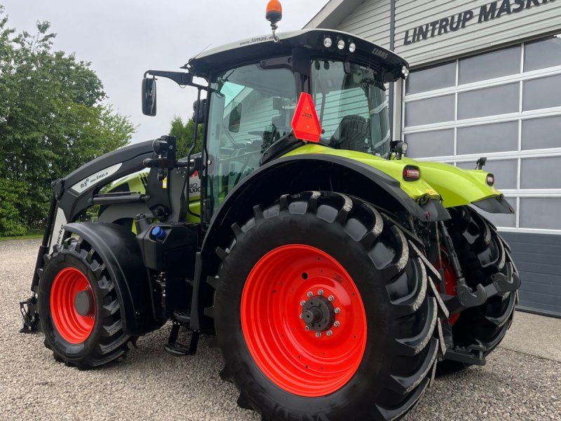 Claas Axion 810 CMATIC Med frontlift og frontlæsser