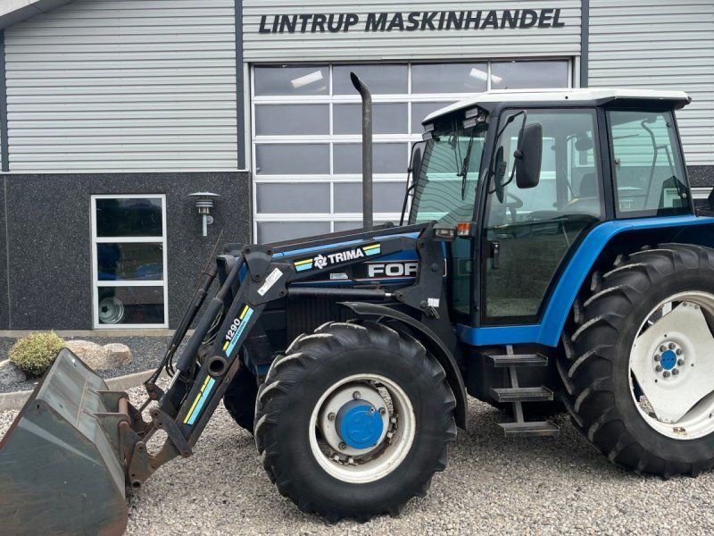 New Holland 7740 SLE med frontlæsser