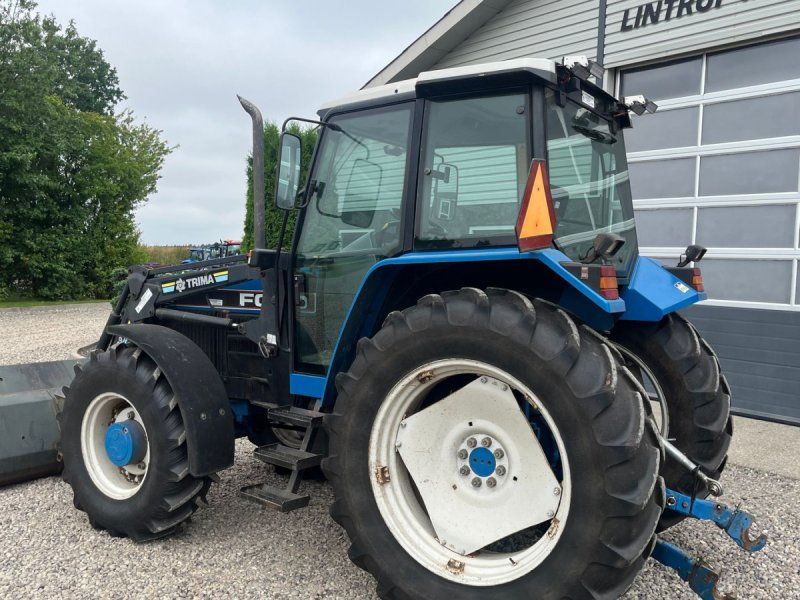 New Holland 7740 SLE med frontlæsser
