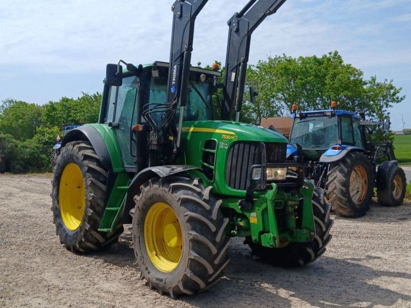 John Deere 7530 Auto Quard med frontlæsser og frontlift