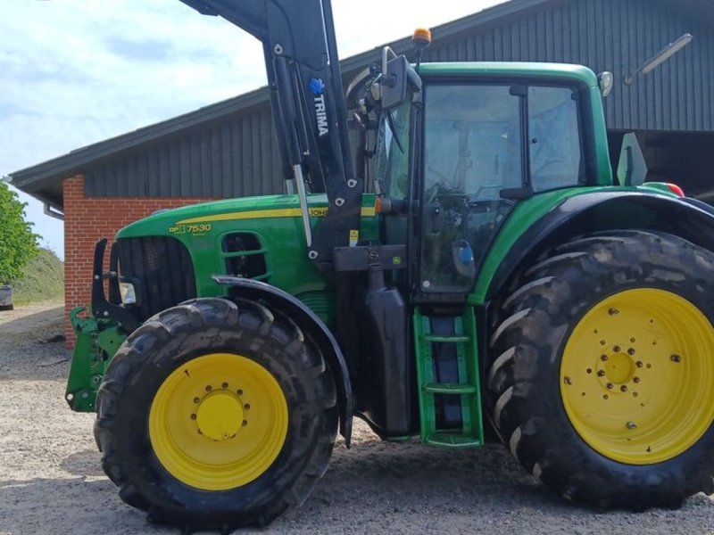 John Deere 7530 Auto Quard med frontlæsser og frontlift