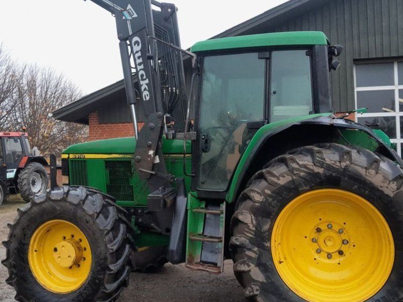 John Deere 6910 PowerQuad TLS med ÅLØ 980 frontlæsser og trykluftbremser