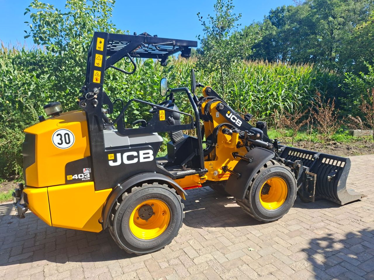 JCB 403 plus stage 5 | bj 2021 | 2320uur | puinbak lepels