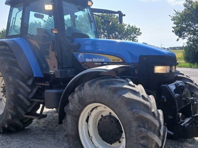 New Holland TM 155 med nye bagdæk og frontlift