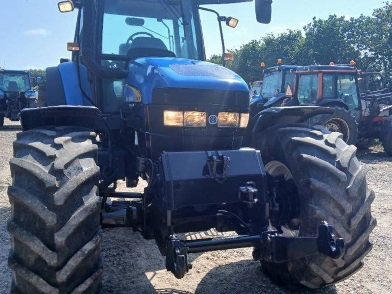 New Holland TM 155 med nye bagdæk og frontlift