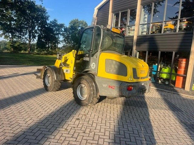 Gebruikte WACKER WL60 kniklader met gewicht van 5900 kgs