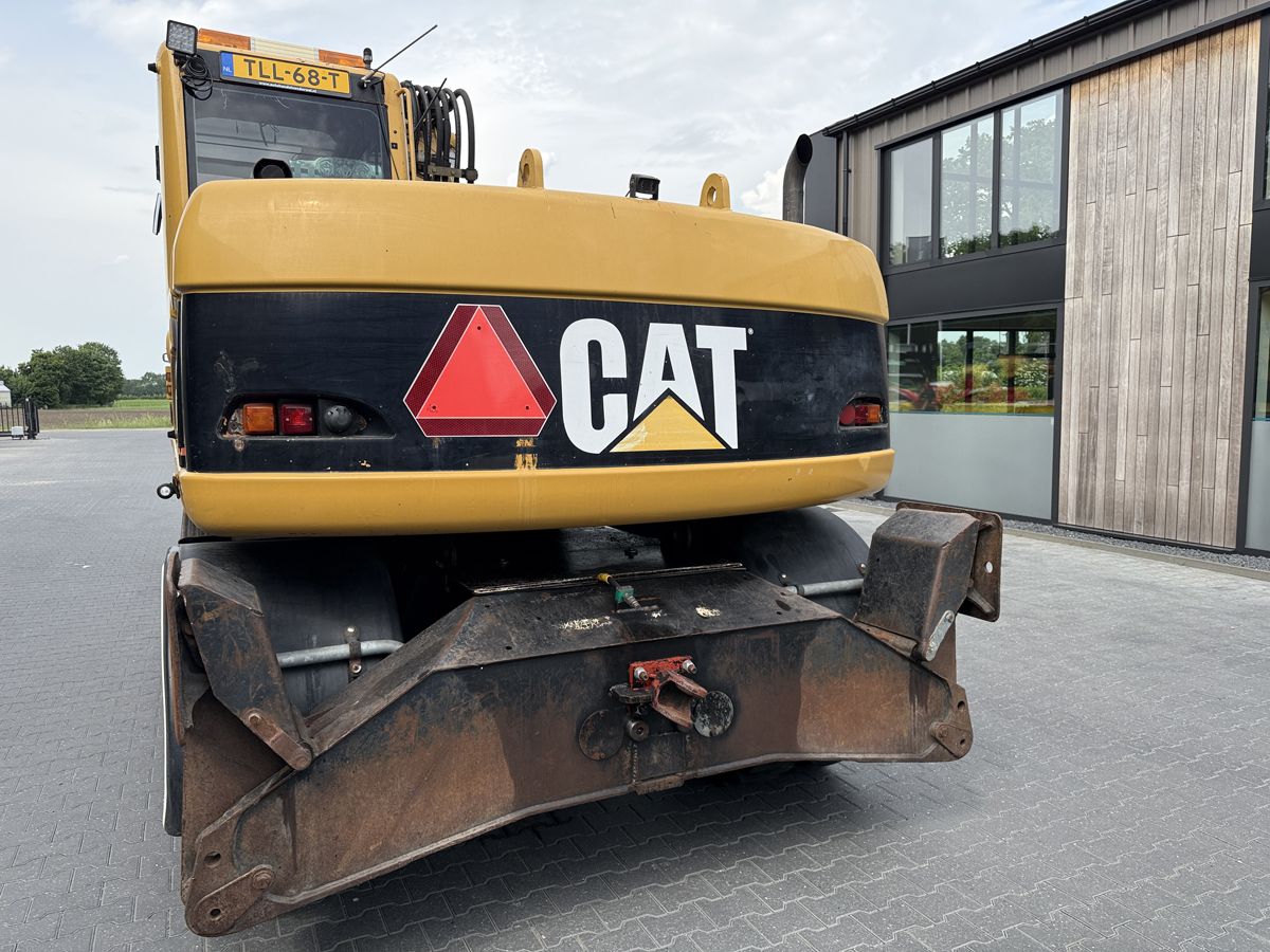 Gebruikte CATERPILLAR M313D mobiele kraan met airco
