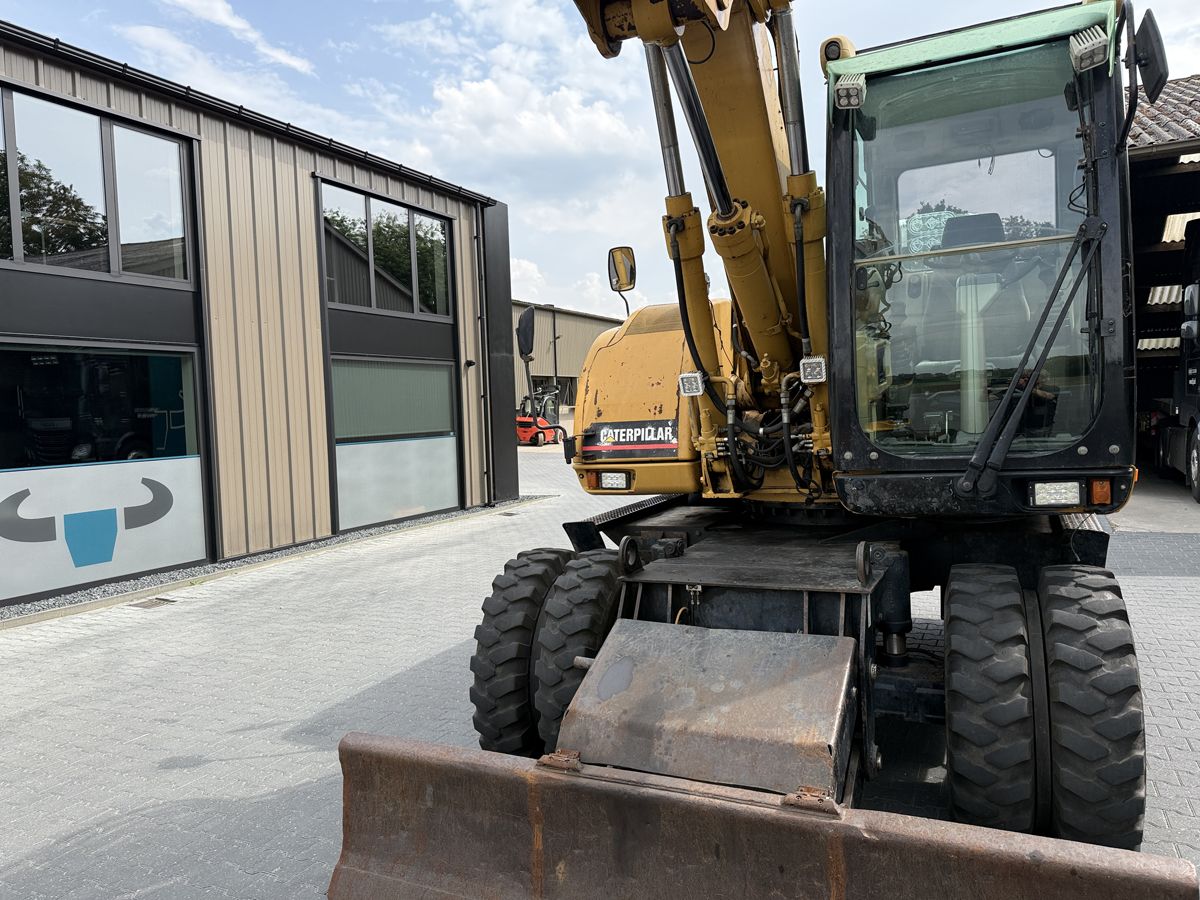Gebruikte CATERPILLAR M313D mobiele kraan met airco