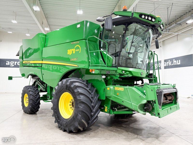 John Deere S685i Hillmaster rotary, 9,15 m 630R header, transport trailer,