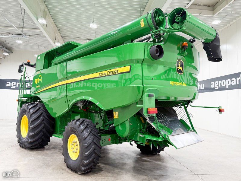 John Deere S685i Hillmaster rotary, 9,15 m 630R header, transport trailer,
