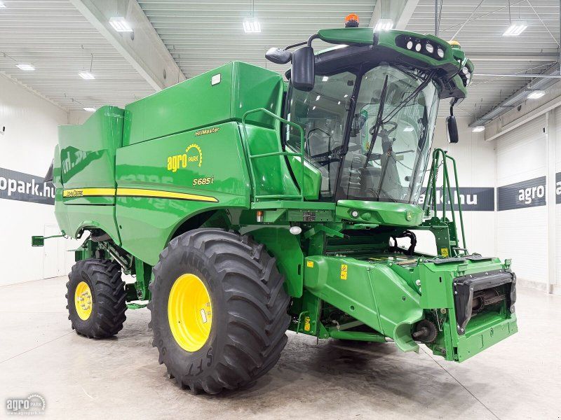 John Deere S685i Hillmaster rotary, 9.15 m 630PF draper header, header trai