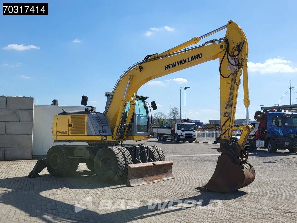 New Holland MH 5.6 Outriggers + Blade
