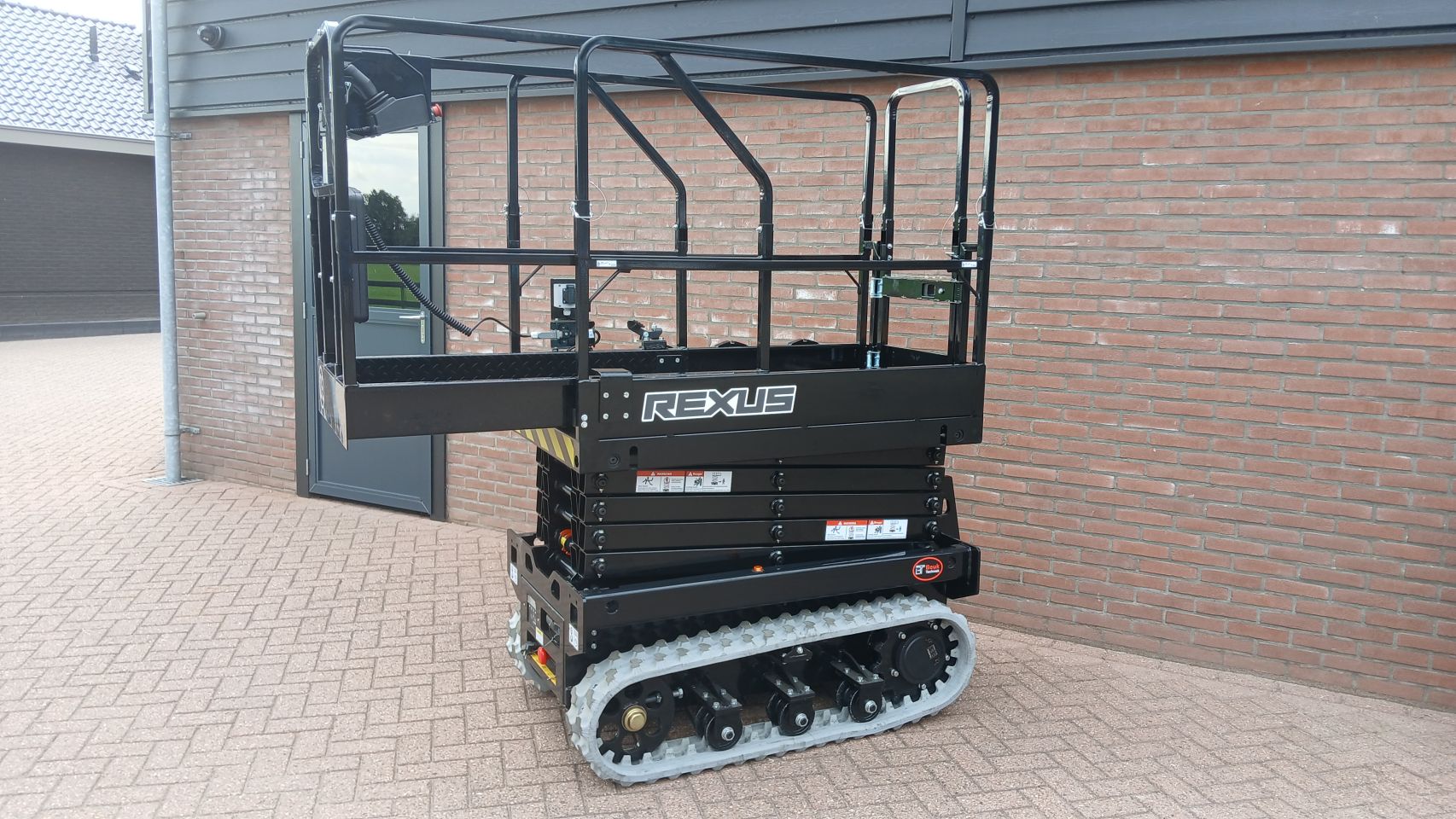 Elektrische Schaarhoogwerker 7.8m – Rups - Compact - Nieuw