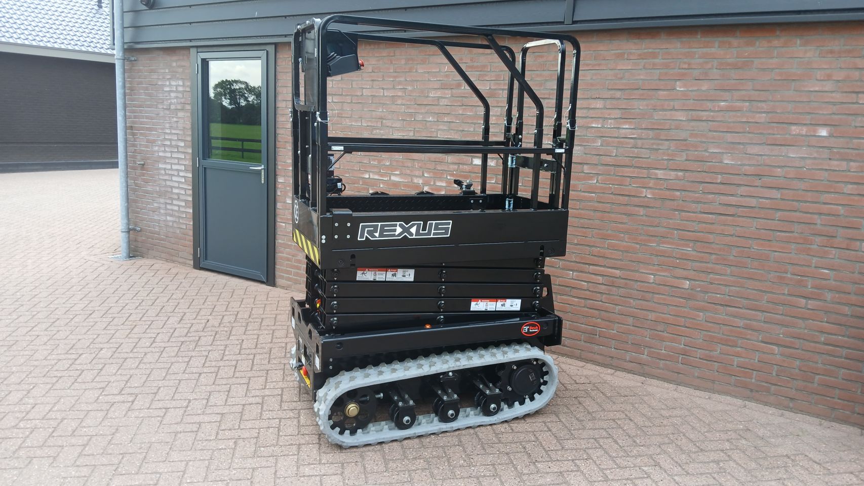 Elektrische Schaarhoogwerker 7.8m – Rups - Compact - Nieuw