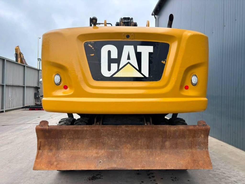 CAT M320F