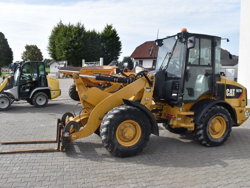 Caterpillar 907M mit Straßenzulassung