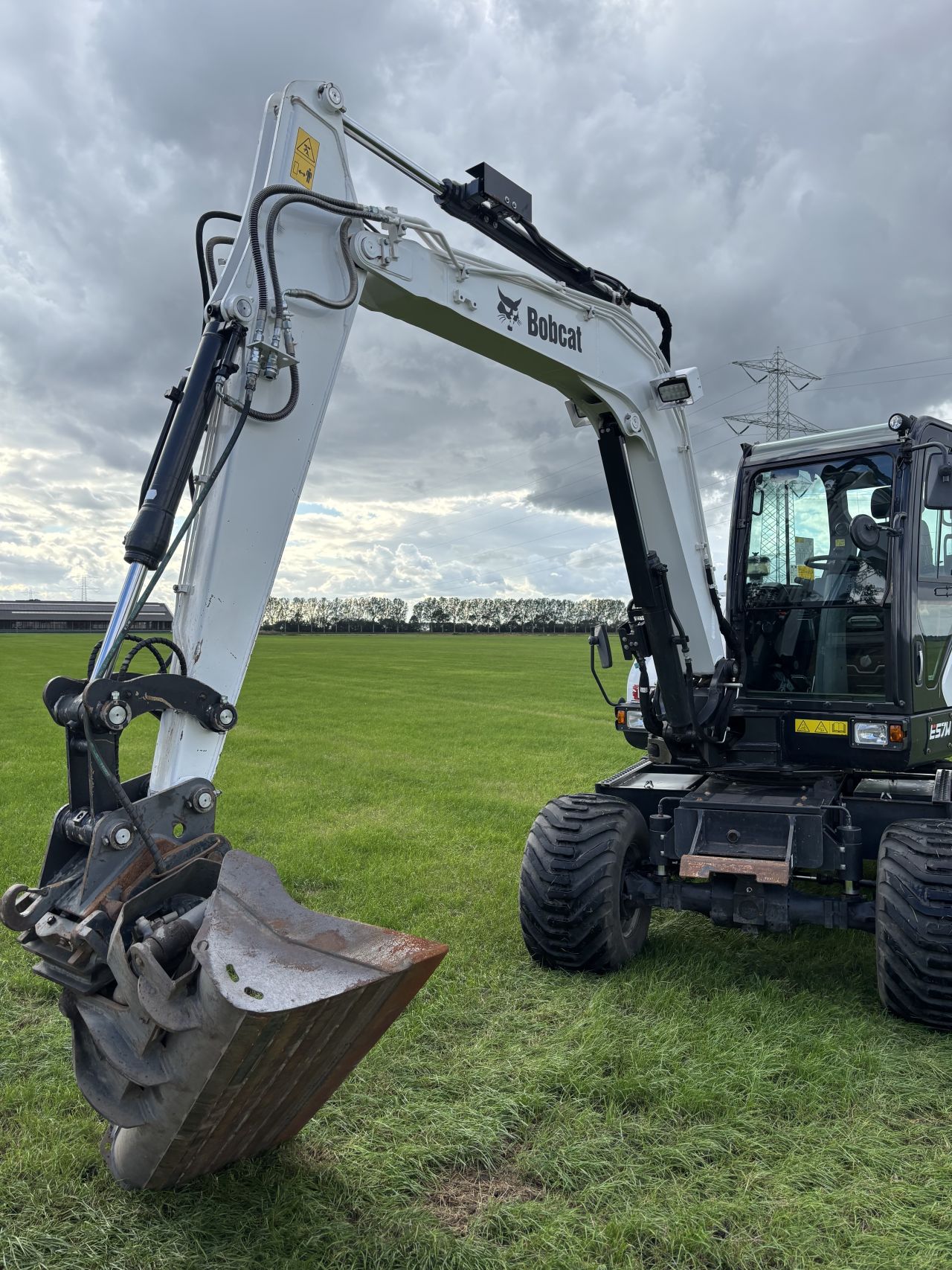 Bobcat E57W mobiele graafmachine doosan DX57W