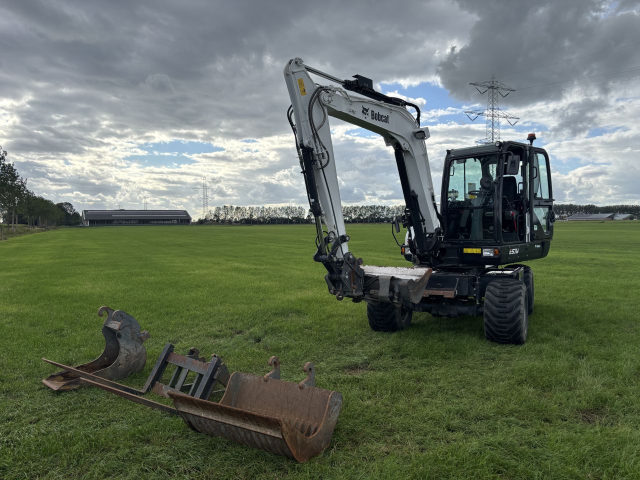Bobcat E57W mobiele graafmachine doosan DX57W
