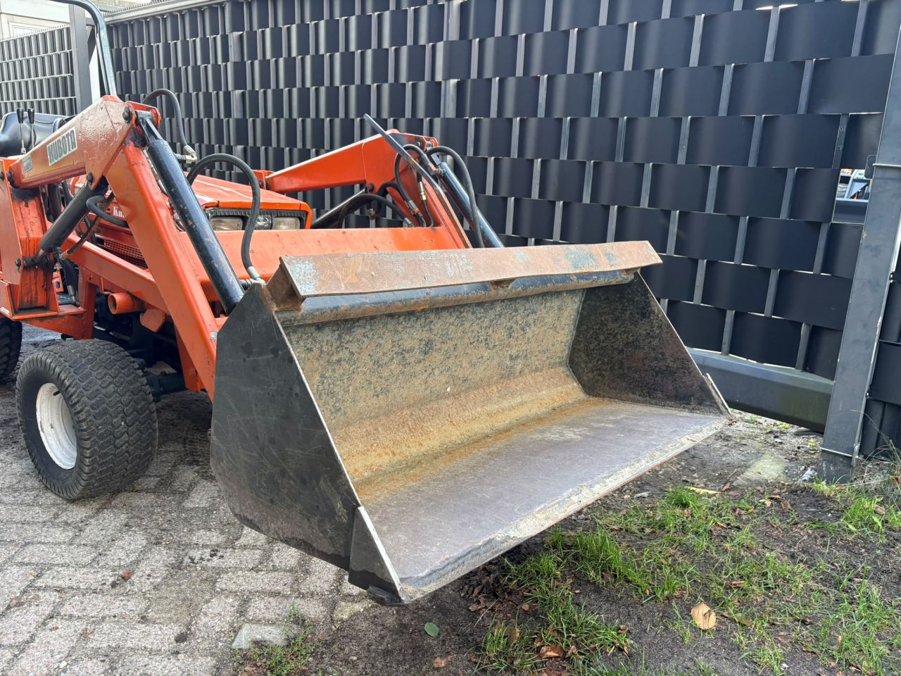 Kubota minitrekker met voorlader minishovel iseki yanmar