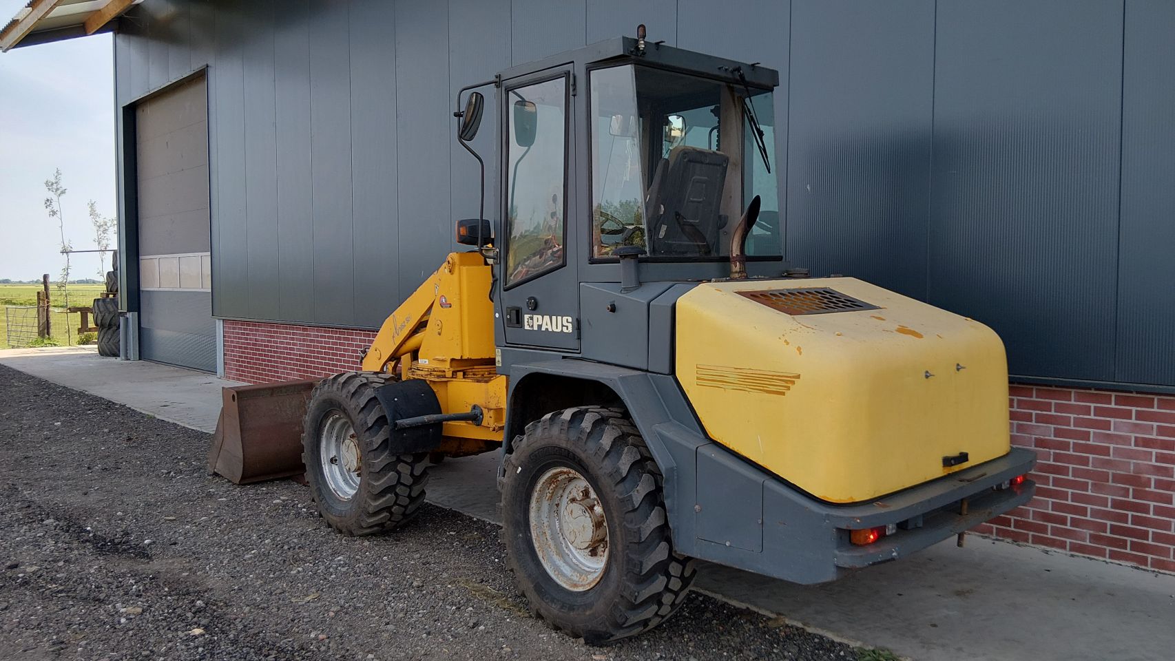 Paus RL1052SL shovel draaigiek (bj2006) bak+vorken RL 1
