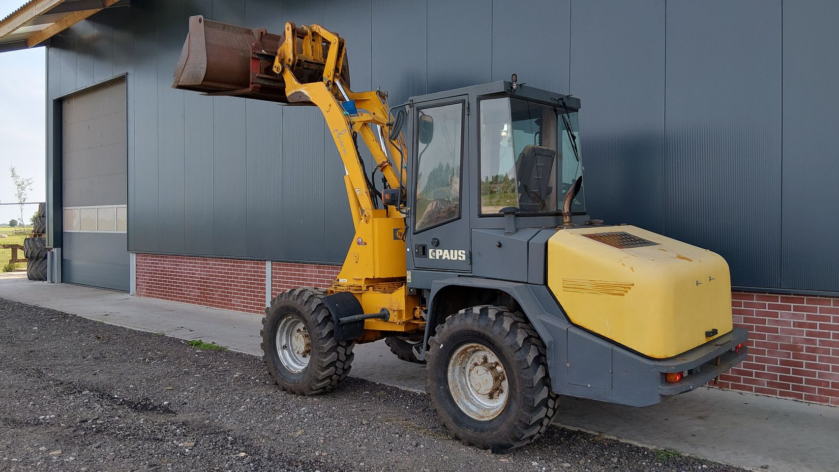 Paus RL1052SL shovel draaigiek (bj2006) bak+vorken RL 1
