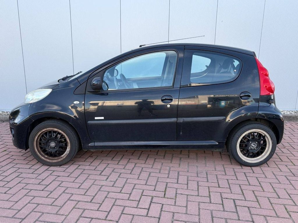 Personenauto Peugeot 107 1.0-12V Millesim 200 Benzine 68pk 2011 (Marge)
