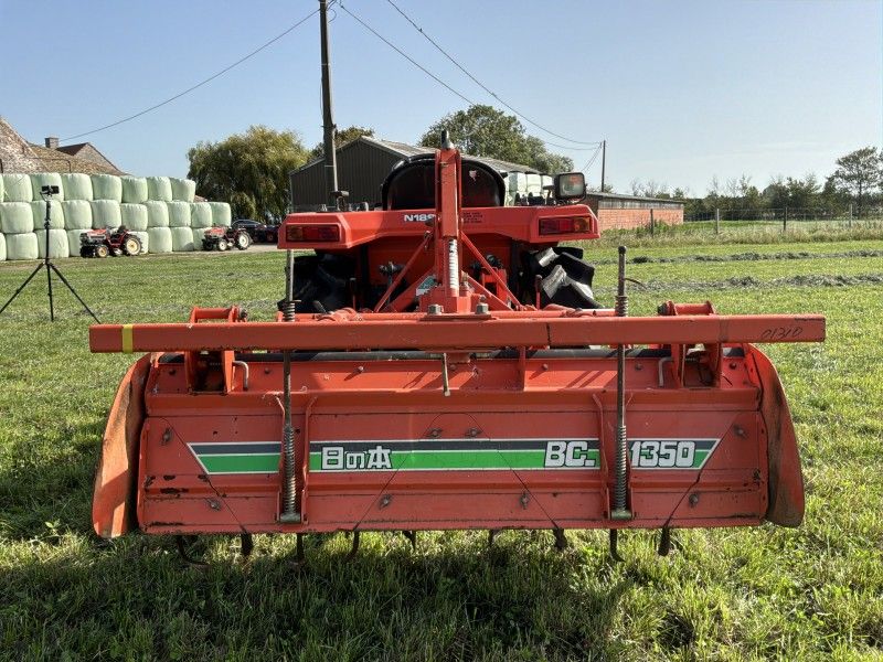 Hinomoto N189 four-wheel-drive mini-tractor with rotary tiller