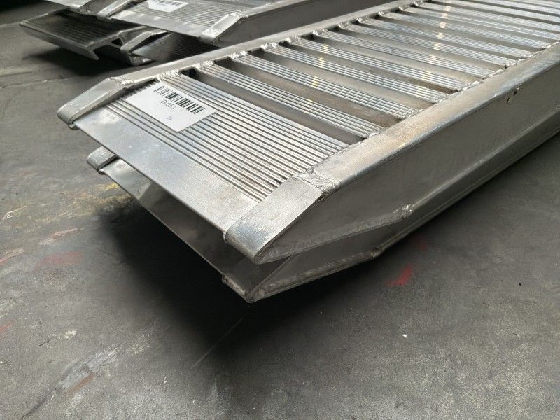 Aluminum ramps (unused) (2)