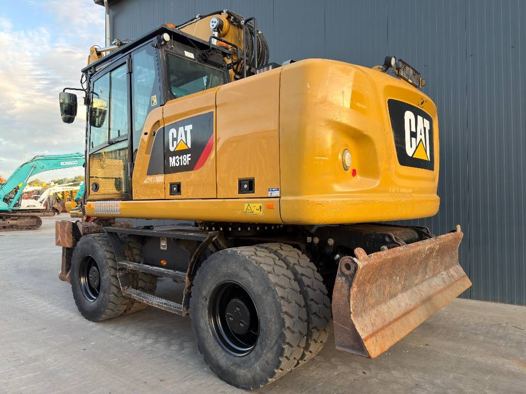 CAT M318F