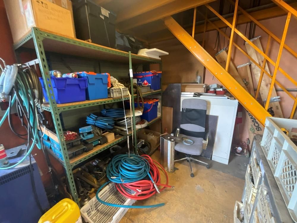 Workshop shelving with contents