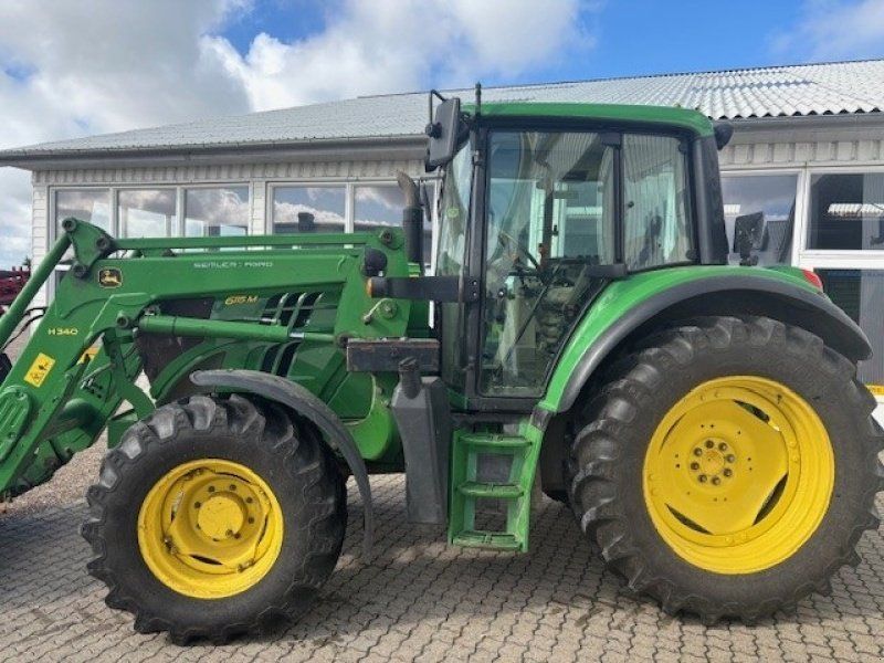 John Deere 6.115M
