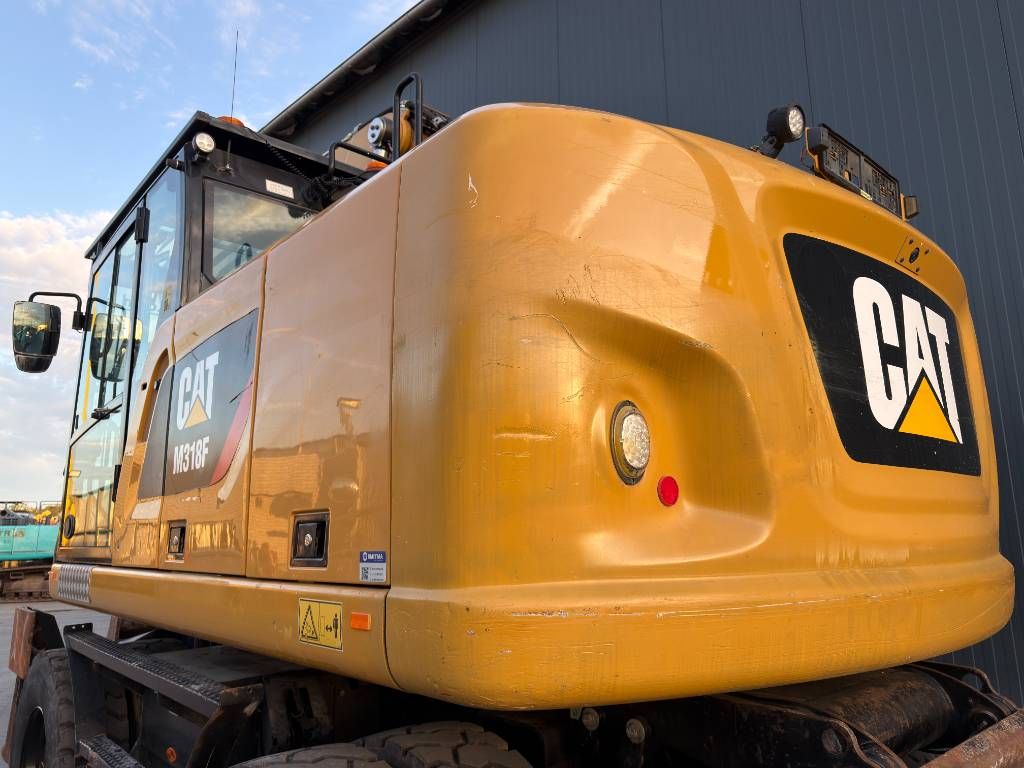 CAT M318F