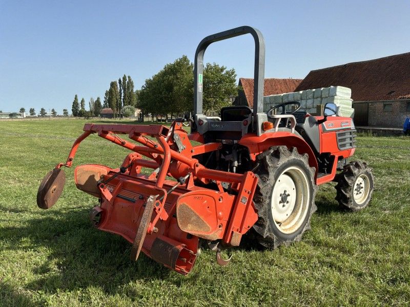 1992 Kubota Granbia GB18(F) four-wheel-drive mini-tractor with rotary tiller