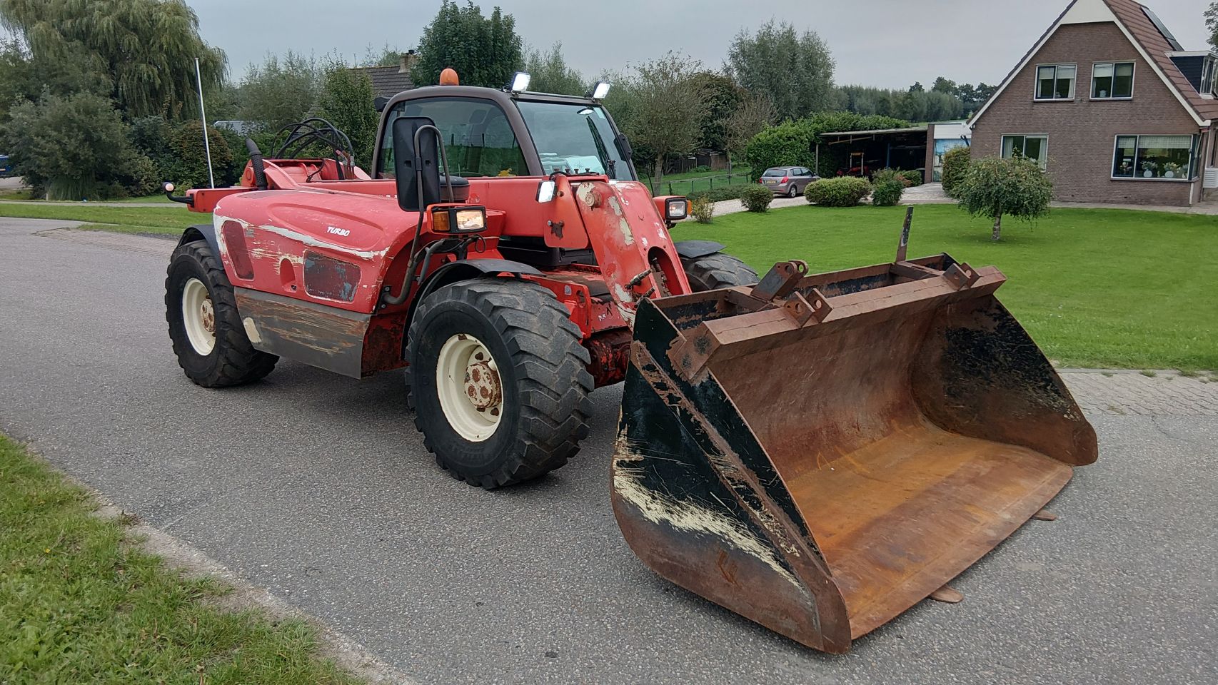 Manitou MVT 628 turbo verreiker (weinig uur) bak+vorken