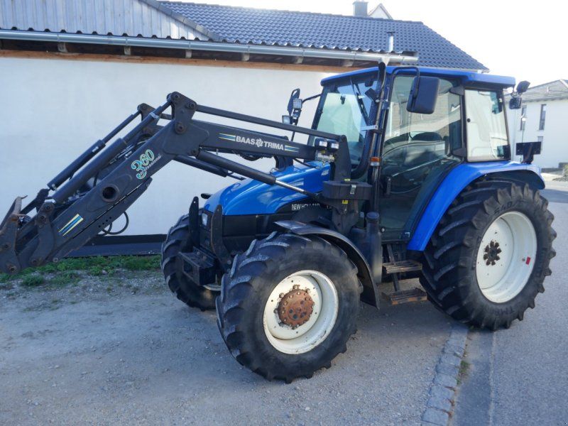New Holland TL 100. Ind-Lader, Klima, Druckluft, Lastschaltung.  