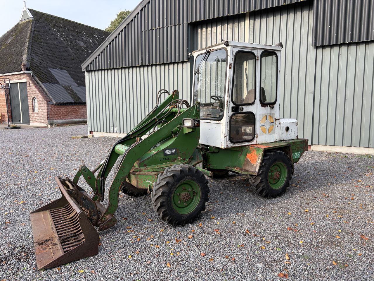 Schaeff SKS 611 minishovel met zwenkgiek