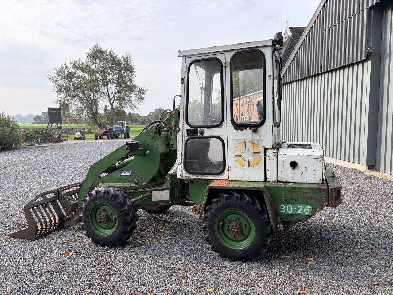 Schaeff SKS 611 minishovel met zwenkgiek