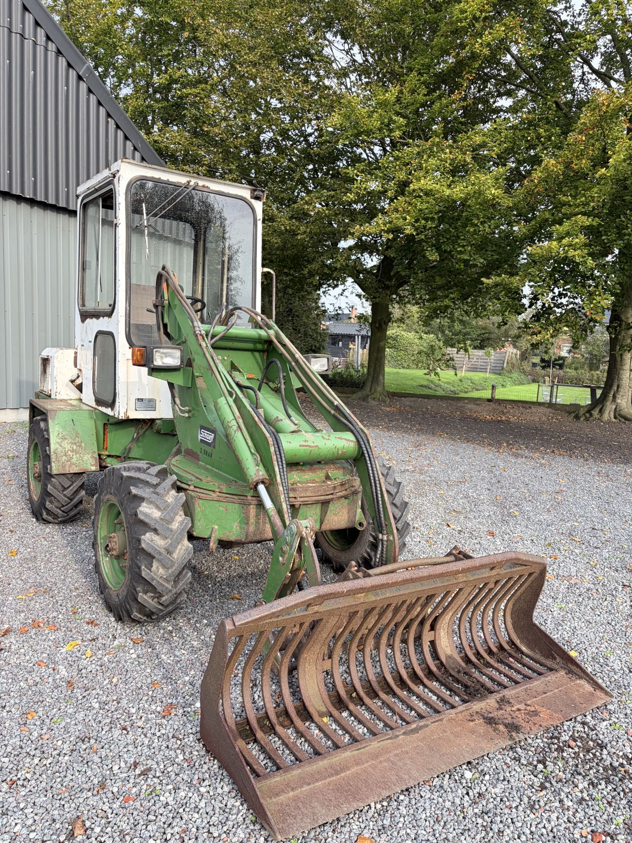 Schaeff SKS 611 minishovel met zwenkgiek