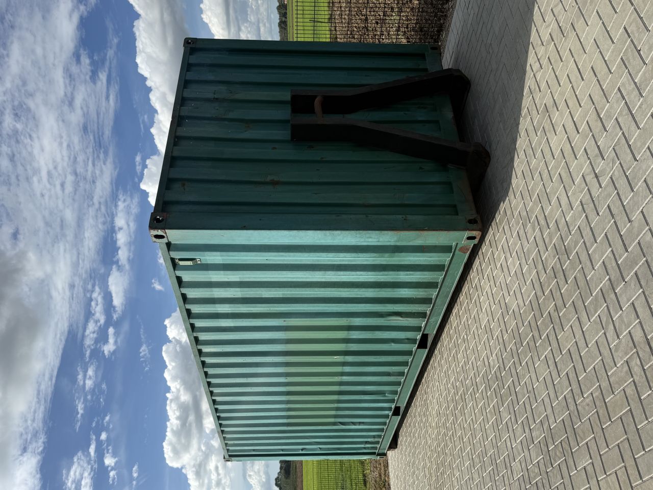 20ft zeecontainer met haakarm opname