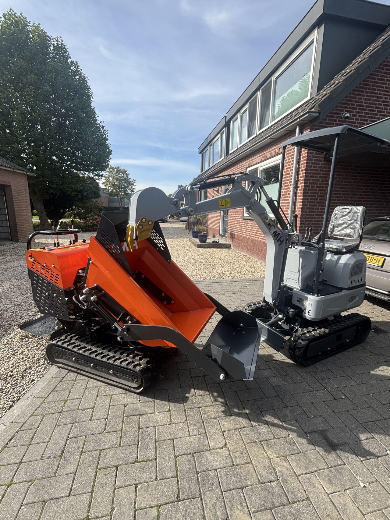 Minigraver Rupsdumper Cmh JMH graafmachine
