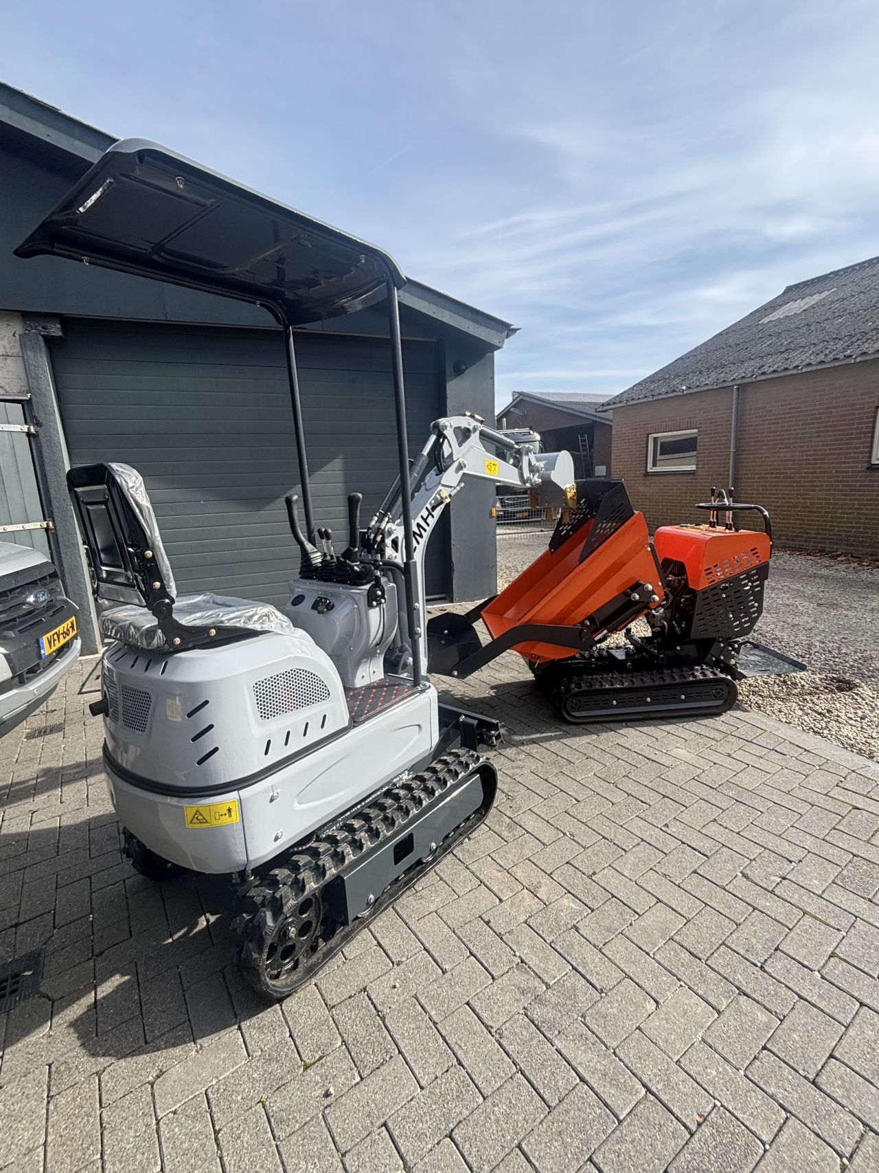 Minigraver Rupsdumper Cmh JMH graafmachine