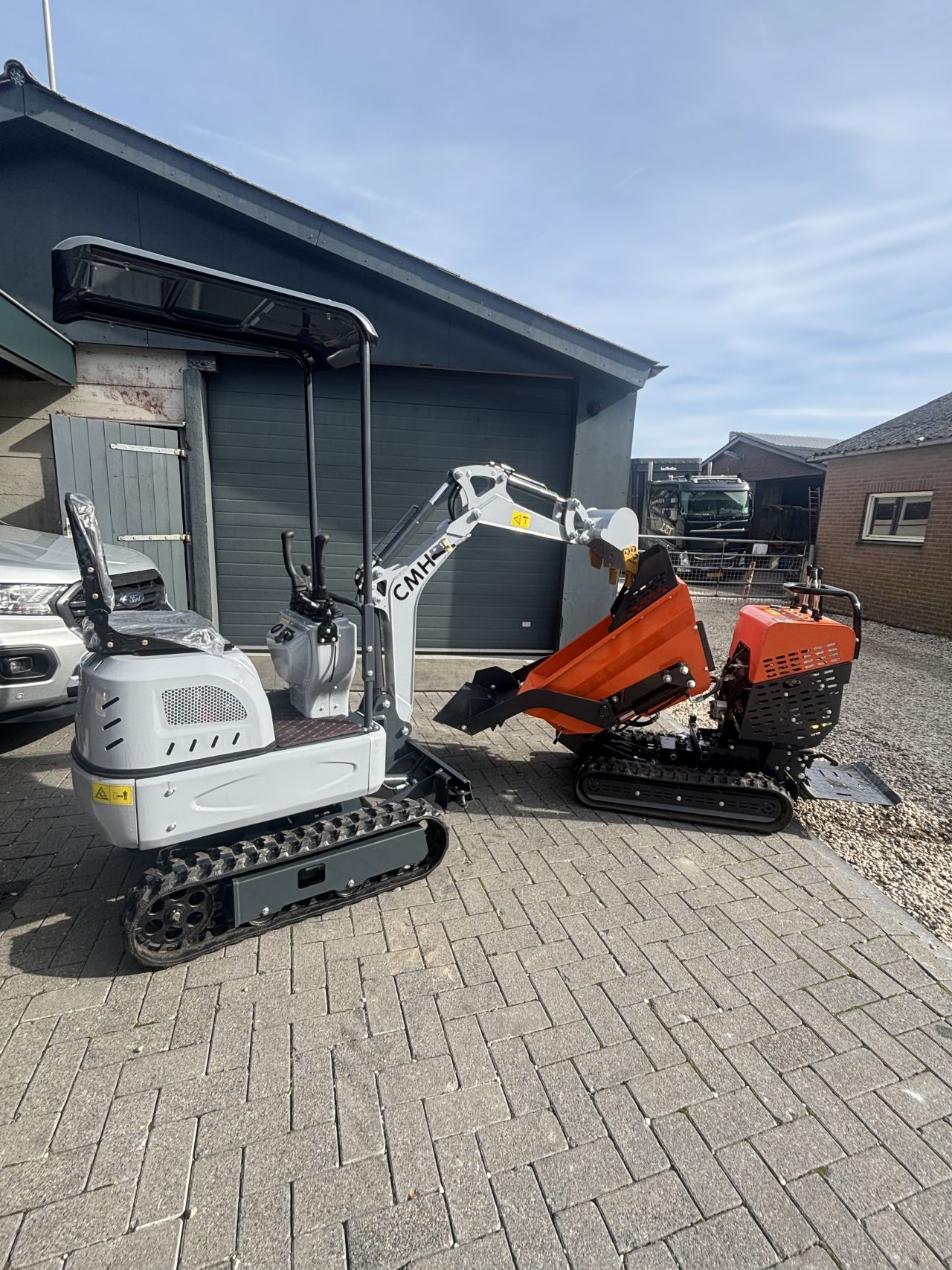 Minigraver Rupsdumper Cmh JMH graafmachine