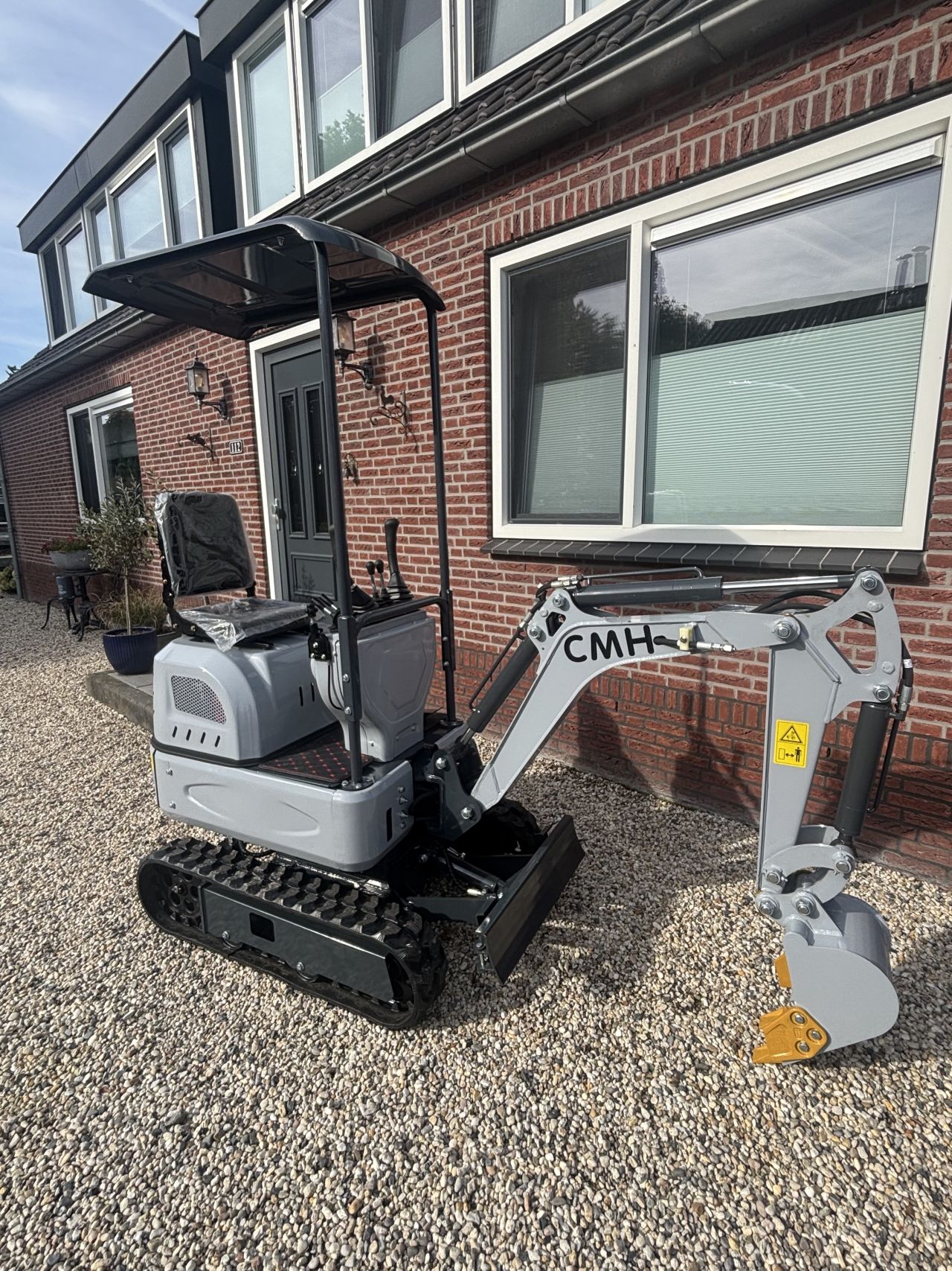 Minigraver Rupsdumper Cmh JMH graafmachine