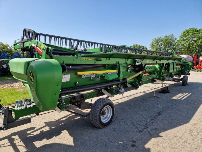 John Deere 735X mit Wagen